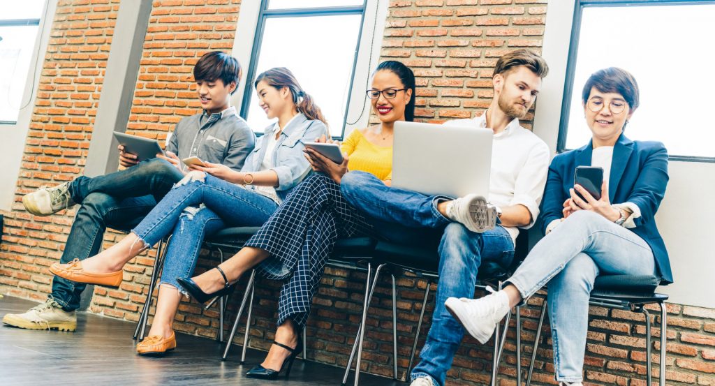 Phil Gosselin et al. sitting on a bench