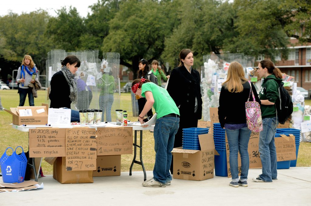 A group of people sitting in a box