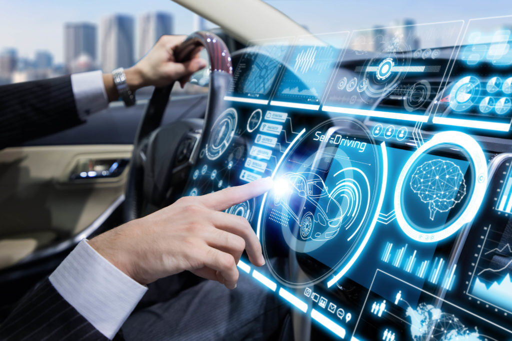 A hand holding the car steering and change some car settings