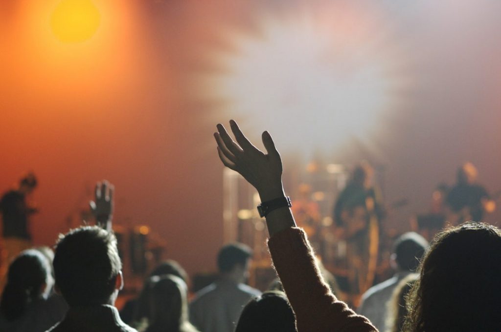 A person standing in front of a crowd